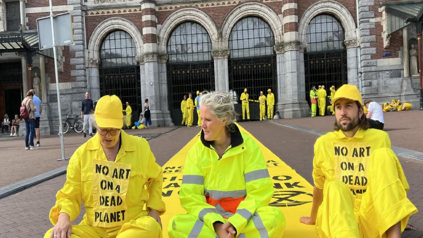 Climate activists block the entrance to the Rijksmuseum, the largest museum in the Netherlands, in Amsterdam